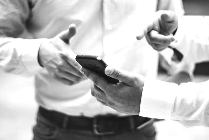person holding black smartphone