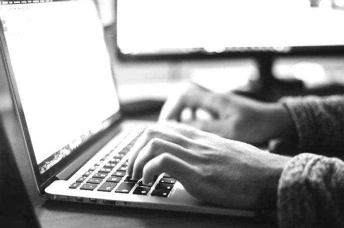 person using MacBook Pro